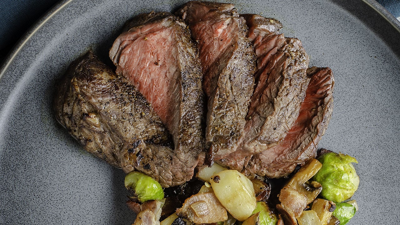 top sirloin steak with bacon and brussels sprout hash