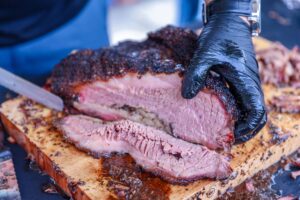 chef slicing beef brisket