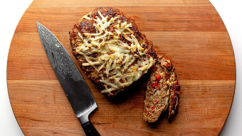 chili meatloaf on a cutting board