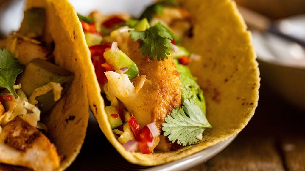 cod tacos with spicy crema and slaw