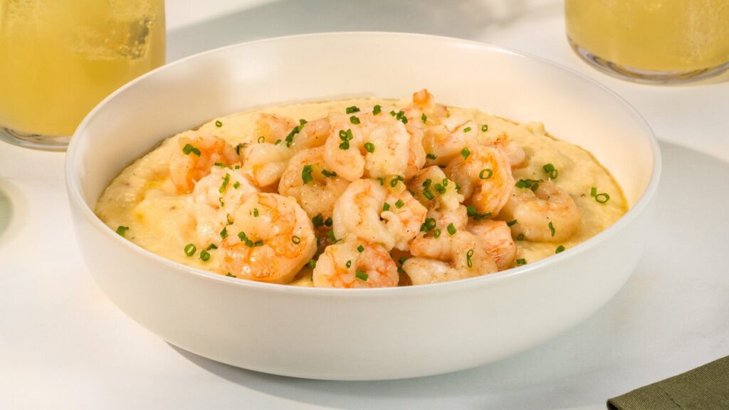shrimp and grits in a bowl with juice
